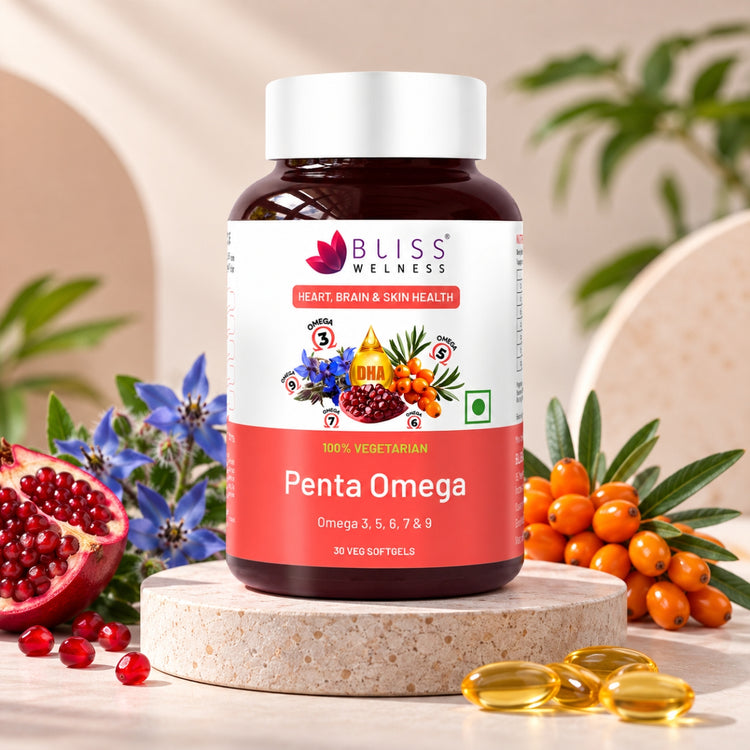 Bliss Wellness Penta Omega dietary supplement capsules on a stone pedestal, surrounded by fresh ingredients including a pomegranate, blue flowers, sea urchin, and golden softgel capsules.