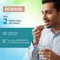 Man taking a pill with a glass of water, dosage instructions